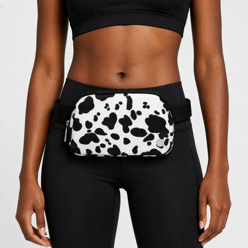Mandotos International 1L breathable women's fanny pack, ideal for travel and outdoor activities, shown in a compact, ergonomic design.