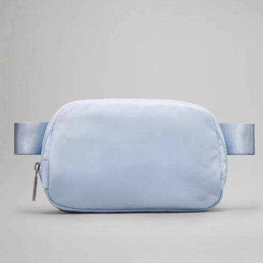 Mandotos International 1L breathable women's fanny pack for travel and outdoor use, featuring a lightweight, adjustable design.
