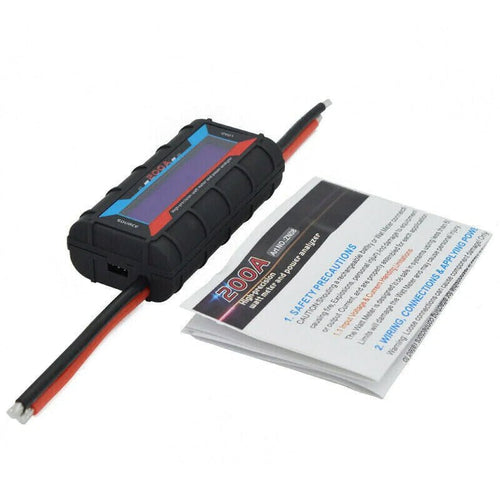 Mandotos International 200A DC LCD Power Analyzer measuring RC batteries and solar power with digital display and control buttons.