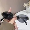 Women's 2024 geometric PC sunglasses by MANDOTOS INTERNATIONAL with elliptical metal large frame and personalized design.