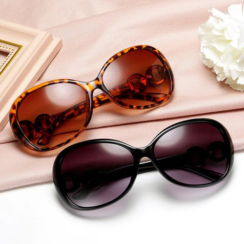 Vintage retro oversized sunglasses for women by MANDOTOS INTERNATIONAL, stylish travel eyewear with a chic, bold design.