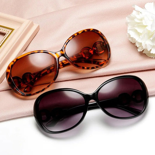 Vintage retro oversized sunglasses for women by MANDOTOS INTERNATIONAL, stylish travel eyewear with a chic, bold design.