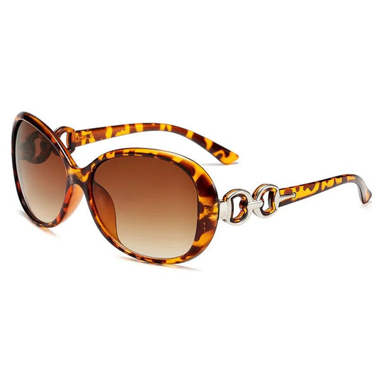 Vintage retro oversized sunglasses for women by MANDOTOS INTERNATIONAL, stylish travel eyewear with a chic design.