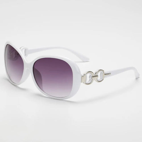 Vintage retro oversized sunglasses for women by MANDOTOS INTERNATIONAL, featuring a chic design and travel-ready style.