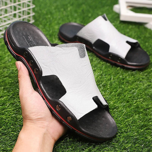 Retro leather men's summer beach slippers by MANDOTOS INTERNATIONAL, flat sandals with open-toe design and comfortable slip-on fit.