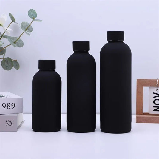 Mandotos International 500ml stainless steel insulated sports water bottle with a sleek design and secure lid.