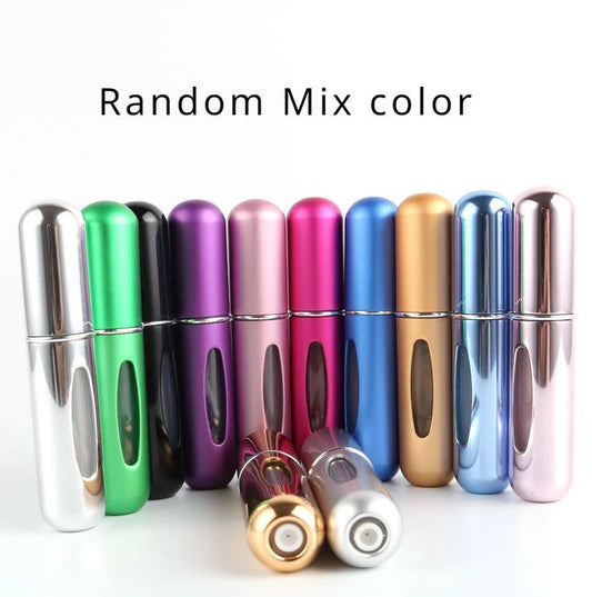 Small 5ml MANDOTOS INTERNATIONAL travel perfume atomizer in sleek aluminum bottle, compact and portable for on-the-go fragrance.