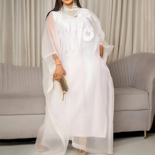 Elegant white African abaya dress for women with embroidery, plus size, suitable for parties or church events, by MANDOTOS INTERNATIONAL.