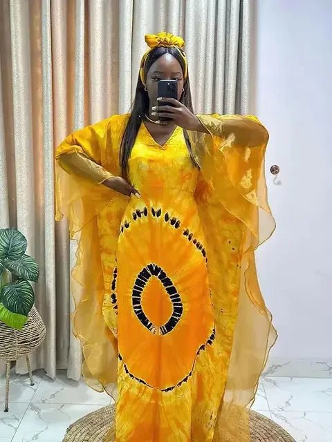 African Dashiki Ankara maxi dress for women, traditional long clothing with vibrant patterns by MANDOTOS INTERNATIONAL.