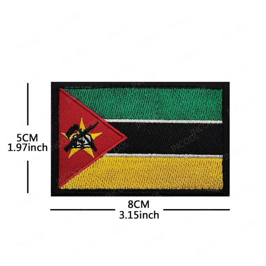 Embroidery patches of African flags and badges featuring Morocco, Nigeria, Gabon, Libya, and Namibia by Mandotos International.