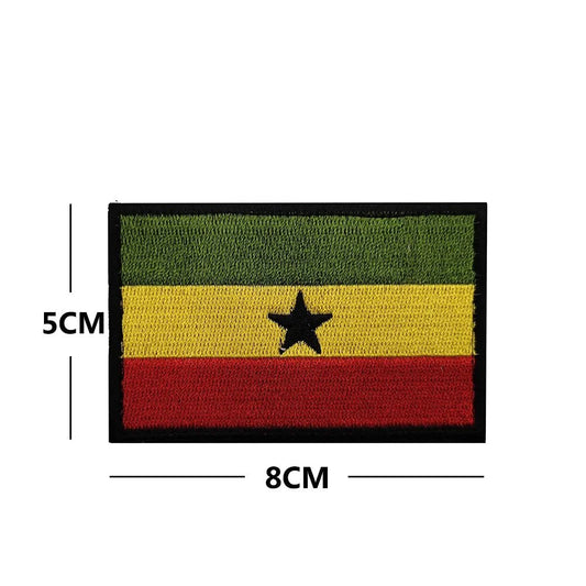 Embroidery patches of African flags and badges featuring Morocco, Nigeria, Gabon, Libya, and Namibia by MANDOTOS INTERNATIONAL.