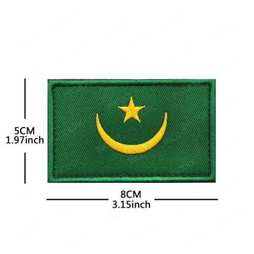 Embroidery patches of African flags and badges featuring Morocco, Nigeria, Gabon, Libya, and Namibia by MANDOTOS INTERNATIONAL.