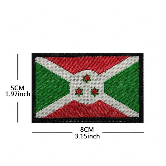 Embroidery patches of African flags and badges from Morocco, Nigeria, Gabon, Libya, and Namibia by MANDOTOS INTERNATIONAL.