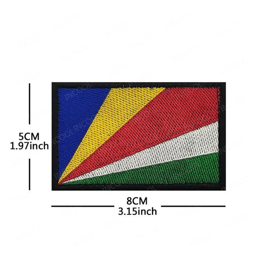 Embroidery patches of African flags and badges featuring Morocco, Nigeria, Gabon, Libya, and Namibia by MANDOTOS INTERNATIONAL