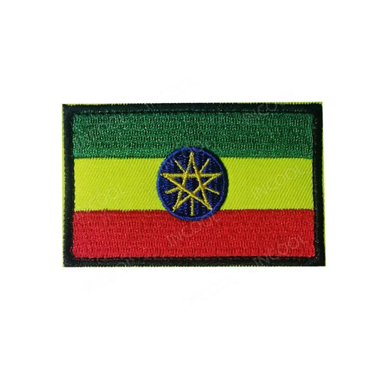 Set of African flags and badges embroidery patches featuring Morocco, Nigeria, Gabon, Libya, and Namibia by MANDOTOS INTERNATIONAL.
