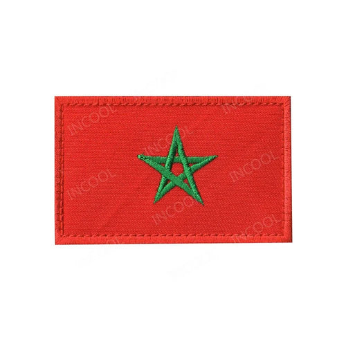Embroidery patches of African flags and badges featuring Morocco, Nigeria, Gabon, Libya, and Namibia by MANDOTOS INTERNATIONAL.