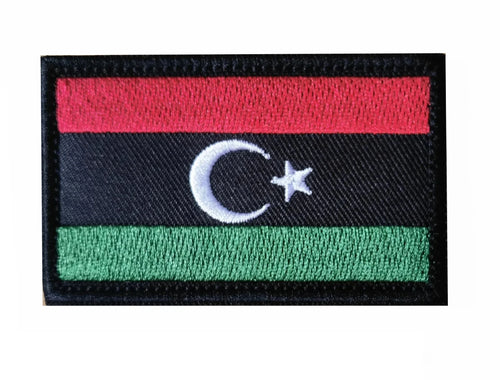 Embroidery patches featuring African flags and badges of Morocco, Nigeria, Gabon, Libya, and Namibia by MANDOTOS INTERNATIONAL.