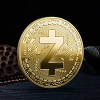 Mandotos International metal crypto currency coin collection featuring Bitcoin, Ethereum, Dogecoin, XRP, and more in a plastic case.