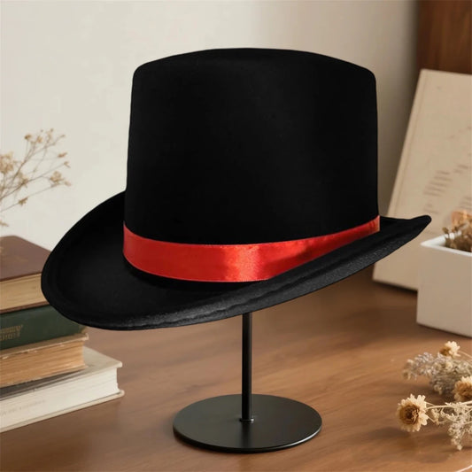 Elegant black top hat for adults, ideal for magician costumes, with a classic and sophisticated design by MANDOTOS INTERNATIONAL.