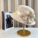 Elegant floral top hat from MANDOTOS INTERNATIONAL, ideal for autumn winter fashion, weddings, and parties for women.