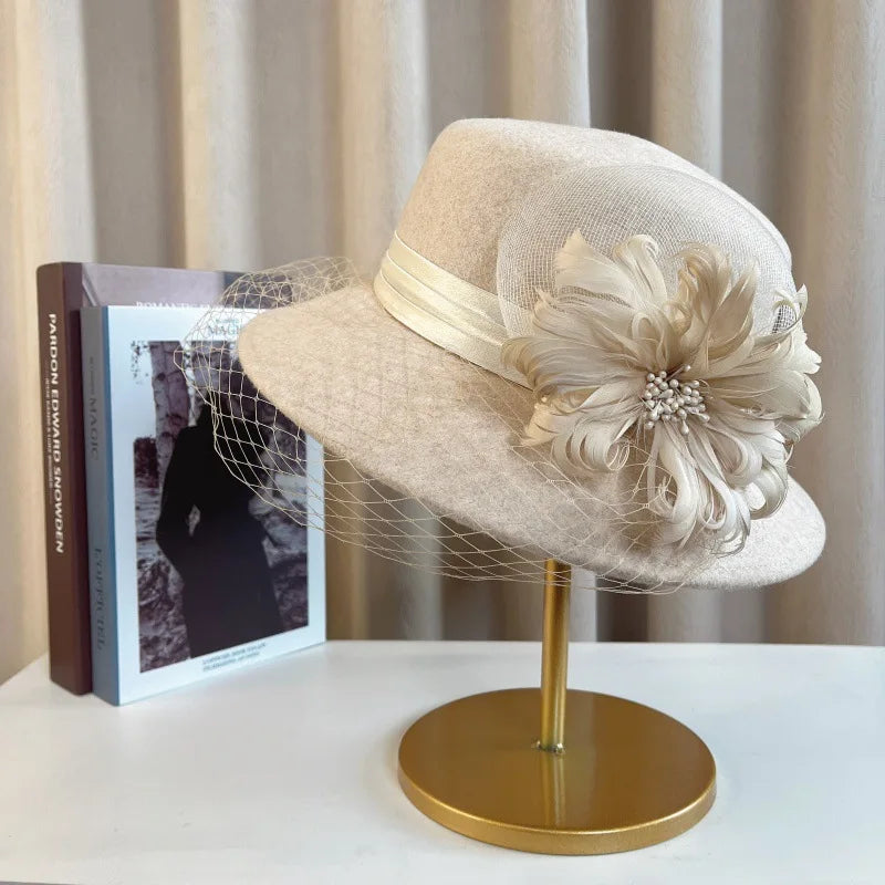 Elegant floral top hat from MANDOTOS INTERNATIONAL, ideal for autumn winter fashion, weddings, and parties for women.