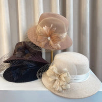 Elegant floral top hats for women in autumn and winter, perfect for weddings and parties, by MANDOTOS INTERNATIONAL.