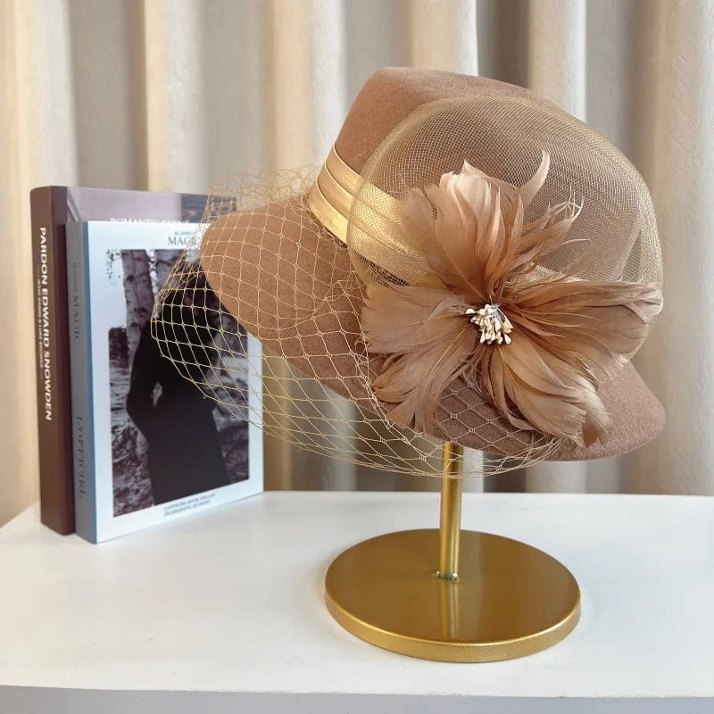 Elegant floral top hat for women, suitable for autumn and winter fashion, wedding, and party occasions, by MANDOTOS INTERNATIONAL.