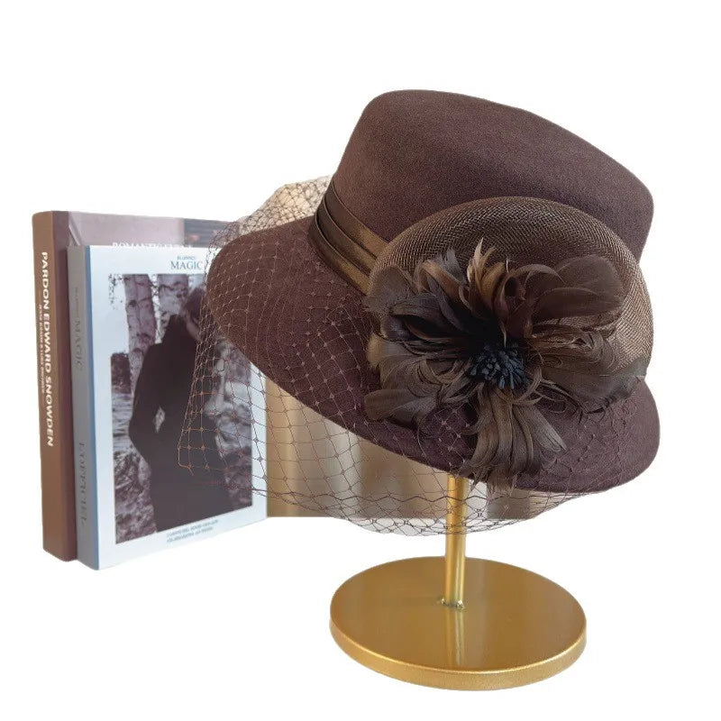 Elegant floral top hat for women by MANDOTOS INTERNATIONAL, perfect for autumn winter fashion, weddings, and parties.