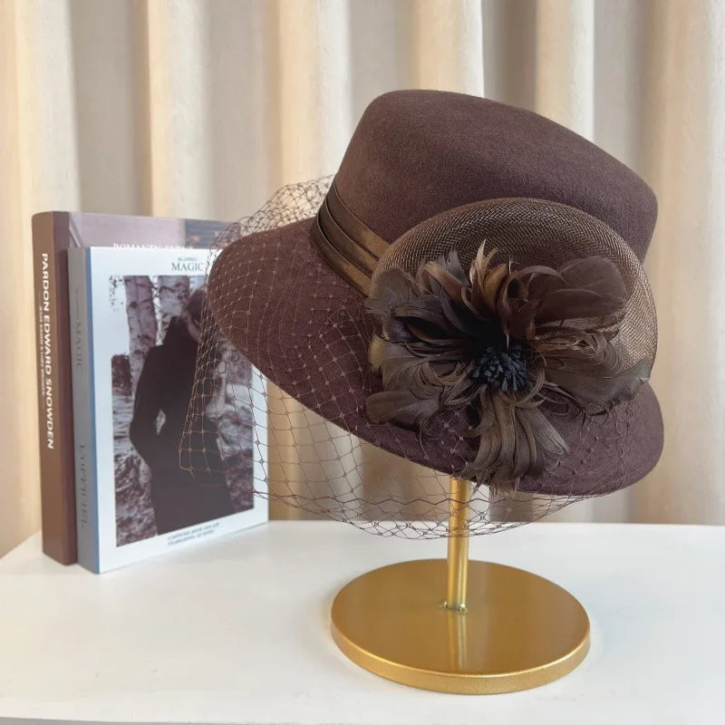 Elegant floral top hat from MANDOTOS INTERNATIONAL, suitable for autumn winter fashion, weddings, and parties, featuring a stylish fedora design.
