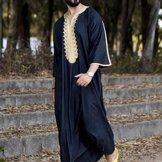 Elegant men's black linen robe by MANDOTOS INTERNATIONAL, shown draped open with a soft, lightweight fabric and tailored fit.