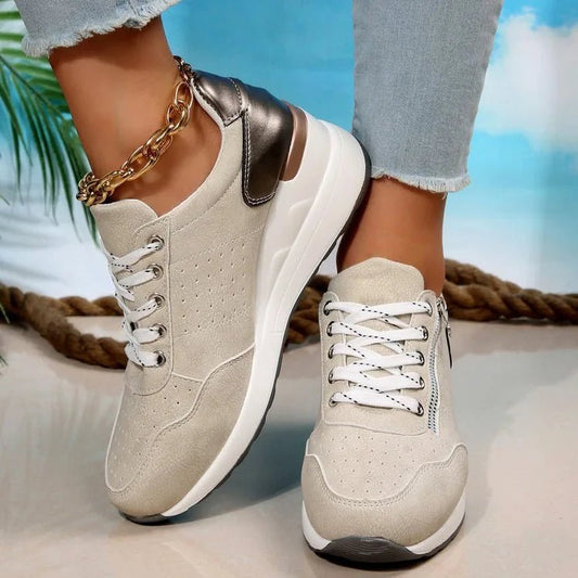 Fashionable lace-up sneakers with zipper detail and medium heel height by MANDOTOS INTERNATIONAL, shown in stylish design.