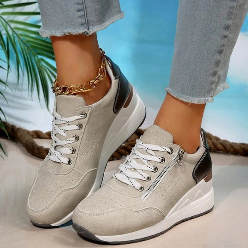 Fashionable lace-up sneakers with zipper detail and medium heel from MANDOTOS INTERNATIONAL, showcasing stylish design and comfortable fit.