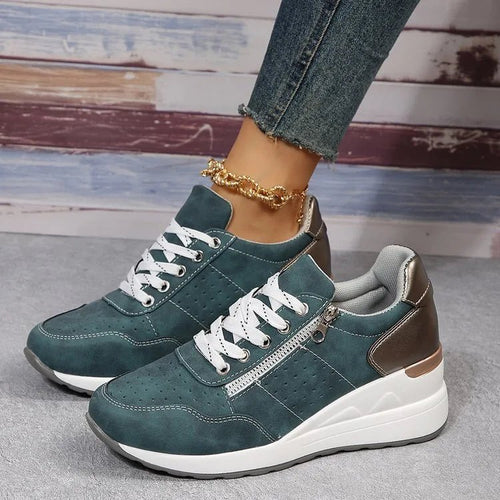 Fashionable lace-up sneakers with zipper detail and medium heel height from MANDOTOS INTERNATIONAL, showing stylish design and comfort.