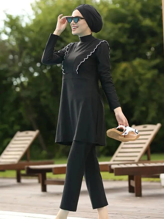 Floral burkini swimsuit for women by MANDOTOS INTERNATIONAL, modest swimwear with colorful floral pattern for middle-aged women.
