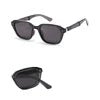 Foldable retro oval sunglasses with black TR90 frame, UV400 polarized lenses, unisex style, by MANDOTOS INTERNATIONAL.