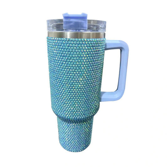 Mandotos International 40oz glitter-coated stainless steel tumbler with diamond design, showcasing its sparkling finish and sleek shape.