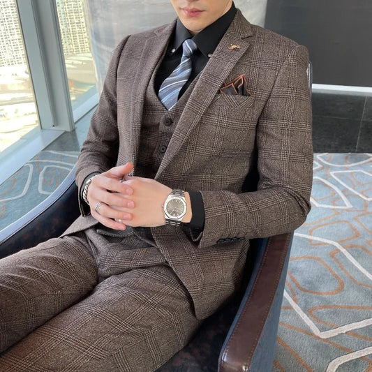 British Korean style plaid men's 3-piece business casual suit set by Mandotos International, featuring a tailored blazer, vest, and trousers.