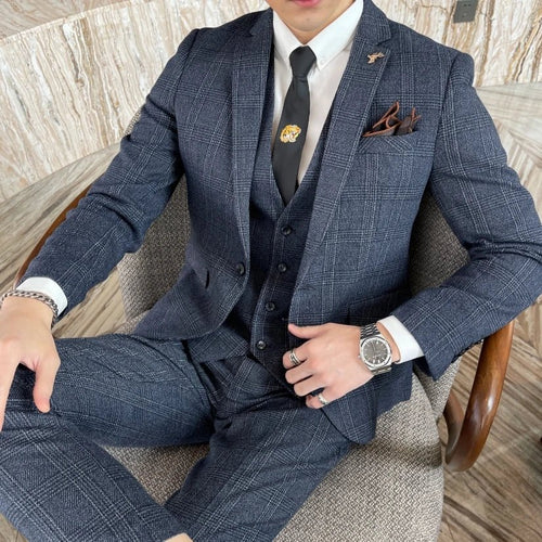 British Korean style plaid men's 3-piece business casual suit set by MANDOTOS INTERNATIONAL, featuring tailored jacket, vest, and trousers.