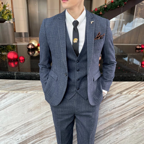 British Korean style plaid men's 3-piece business casual suit set by MANDOTOS INTERNATIONAL, featuring tailored jacket, vest, and trousers.