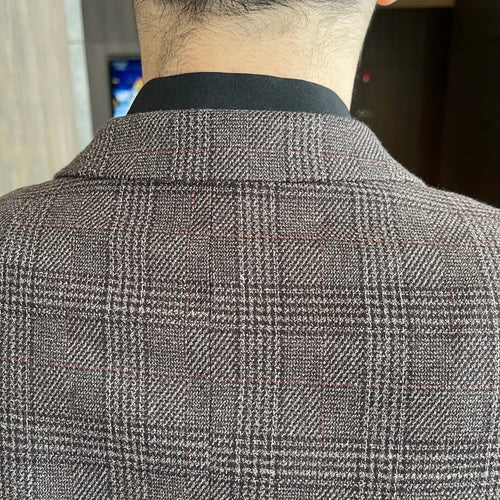 British Korean style plaid men's 3-piece business casual suit set by MANDOTOS INTERNATIONAL, featuring a blazer, vest, and trousers.