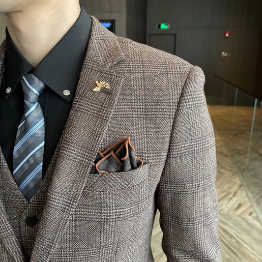 British Korean style plaid men's 3-piece business casual suit set by MANDOTOS INTERNATIONAL, featuring a jacket, vest, and trousers.
