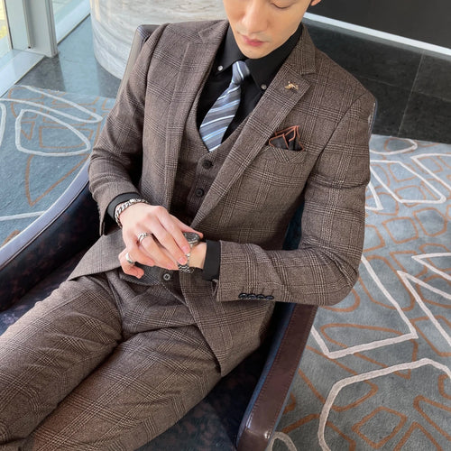 British Korean style plaid men's 3-piece business casual suit set by MANDOTOS INTERNATIONAL, featuring tailored jacket, vest, and trousers.