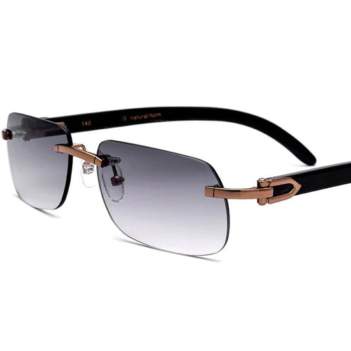 Luxury buffalo horn sunglasses for men and women by MANDOTOS INTERNATIONAL, featuring stylish frames and classic design.