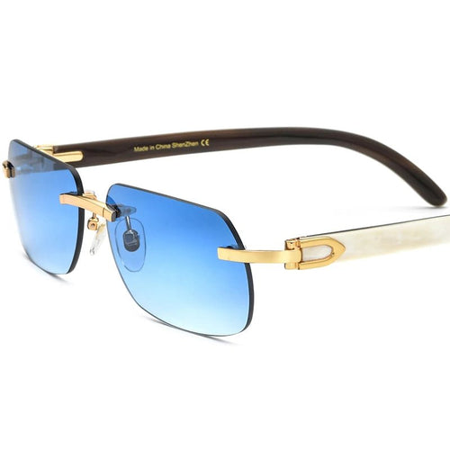 Luxury buffalo horn sunglasses for men and women by MANDOTOS INTERNATIONAL, stylish frame with dark tinted lenses.