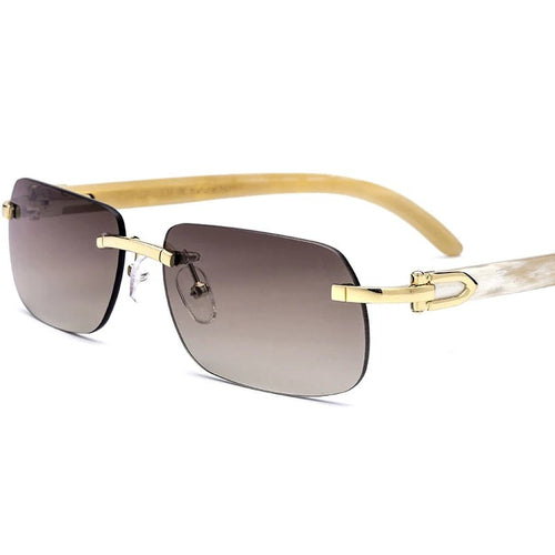 Luxury Buffalo Horn sunglasses for men and women by MANDOTOS INTERNATIONAL, stylish designer eyewear with dark tinted lenses.