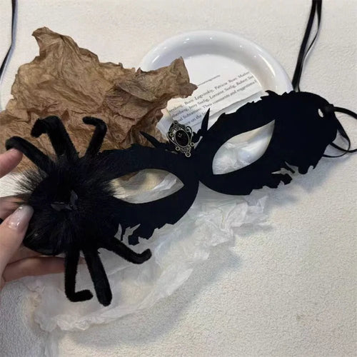 Elegant black lace half-face masquerade mask by MANDOTOS INTERNATIONAL, perfect for Halloween and fancy dress events.