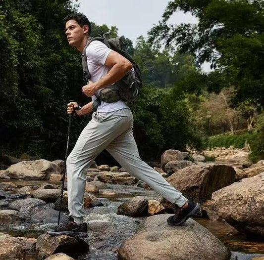 Men's lightweight waterproof hiking shoes by MANDOTOS INTERNATIONAL, designed for all-season outdoor trekking.