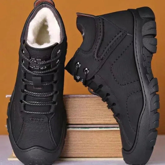 Men's MANDOTOS INTERNATIONAL winter ankle boots, waterproof and non-slip work shoes with sturdy design and winter-ready features.