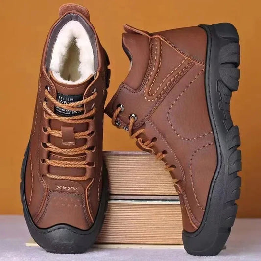 Men's winter ankle boots by MANDOTOS INTERNATIONAL featuring waterproof material and non-slip sole for work and outdoor wear.
