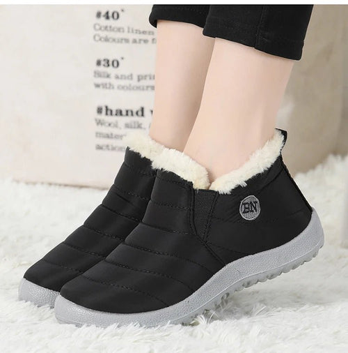 Men's waterproof winter snow boots by MANDOTOS INTERNATIONAL, outdoor work shoes in plus size with rugged sole and insulated design.